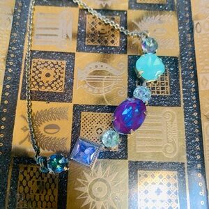 Sorrelli Swarovski Crystal bracelet set in a metal base antique gold tone slider